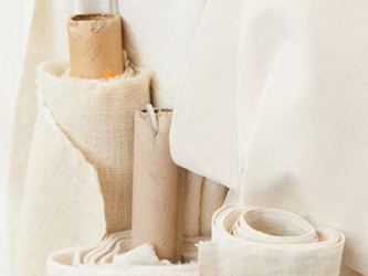 Spools of natural undyed fabrics